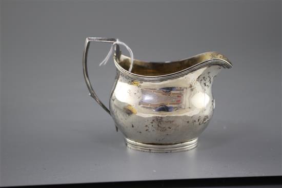 A George III silver helmet shaped cream jug, by Charles Hougham?, London, 1806, height, 85mm, 3oz.